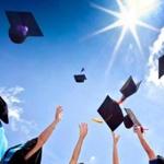 Students with congratulations throwing graduation hats in the air celebrating; Shutterstock ID 115335826; PO: mag 5/1