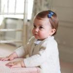 In this undated photo released on Sunday by Kensington Palace, Britain's Princess Charlotte is shown at Anmer Hall in Norfolk, England. 