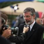Gerry Adams (center), president of Ireland?s Sinn Fein political party. spoke to the media during a 2009 appearance in Boston.
