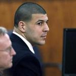 FILE - In this Thursday, April 9, 2015, file photo, former New England Patriots football player Aaron Hernandez, right, sits with defense attorney Charles Rankin, left, before the jury began deliberations in his murder trial in Fall River, Mass. Hernandez was convicted of murder and sentenced to life imprisonment for the 2013 shooting death of Odin Lloyd. The story was a top news item in Massachusetts in 2015. (AP Photo/Steven Senne, Pool, File)