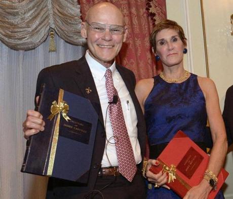 Honorees James Carville and Mary Matalin accept their bound genealogies from NEHGS president and CEO Brenton Simons.
