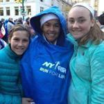 6marathonmom- Amy Flynn, center, with daughters Megan, left, and Cora, right, at the 2014 New York City Marathon. (Family handout)