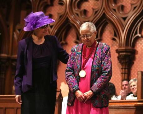 Church moderator Deb Washington (left) presented Sarah-Ann Shaw with The Open Door Award on Sunday.
