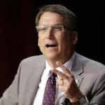 FILE- In this May 4, 2016, file photo, North Carolina Gov. Pat McCrory makes remarks concerning House Bill 2, which limits protections to lesbian, gay, bisexual and transgender people, while speaking during a government affairs conference in Raleigh, N.C. McCrory shows no signs of backing down in the face of the federal government?s Monday, May 9, deadline to declare he won?t enforce the new state law. (AP Photo/Gerry Broome, File)