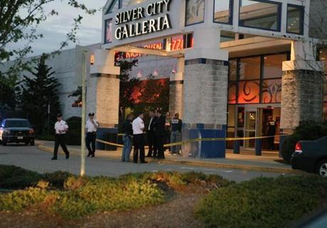 Officials surrounded an entrance to Silver City Galleria in Taunton on Tuesday evening.
