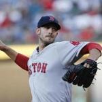 Boston Red Sox starting pitcher Rick Porcello (22) works in the first inning of a baseball game against the Atlanta Braves Monday, April 25, 2016, in Atlanta. (AP Photo/John Bazemore)