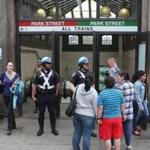 Commuters were seen at Park Street station Friday morning. 