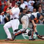 Red Sox catcher Ryan Hanigan beat the throw home for the deciding run in the seventh inning.