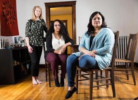 Boston, MA - 5/2/2016 - Ashley Charron(L), Renata Caines, and Luisa Centeno Silva(R) pose for a portrait in their home in Boston, MA, May 2, 2016. (Keith Bedford/Globe Staff)
