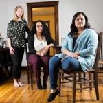 Boston, MA - 5/2/2016 - Ashley Charron(L), Renata Caines, and Luisa Centeno Silva(R) pose for a portrait in their home in Boston, MA, May 2, 2016. (Keith Bedford/Globe Staff)