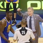 Golden State Warriors head coach Steve Kerr, right, and forward Draymond Green (23) dispute a flagrant foul call on Green in the first half in Game 3 against the Oklahoma City Thunder of the NBA basketball Western Conference finals in Oklahoma City, Sunday, May 22, 2016. (AP Photo/Sue Ogrocki)