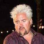 Guy Fieri grills at the Food Network & Cooking Channel South Beach Wine & Food Festival in February in Miami Beach.