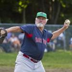 Former Red Sox southpaw Bill Lee, shown in Nova Scotia last year, warming up for a game.