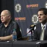 Boston Bruins general manager Don Sweeney, right, speaks alongside head coach Claude Julien, left, at a news conference at TD Garden Thursday, April 14, 2016, in Boston. The Bruins failed to reach the playoffs for the second straight year. (AP Photo/Bill Sikes)