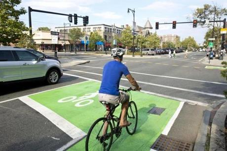A ?bike box? in Brookline gives cyclists more room at traffic lights. 
