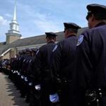 Police officers and first responders lined up at the wake for Auburn Police Officer Ronald Tarentino.