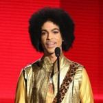 FILE - In this Nov. 22, 2015 file photo, Prince presents the award for favorite album - soul/R&B at the American Music Awards in Los Angeles. A law-enforcement official says that tests show the music superstar died of an opioid overdose. Prince was found dead at his home on April 21, 2016, in suburban Minneapolis. He was 57. (Photo by Matt Sayles/Invision/AP, File)
