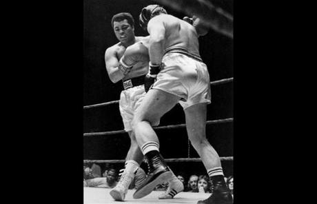 Ali boxed in Boston in 1977, taking on Peter Fuller (above) in a two-round exhibition bout at the Hynes Auditorium.
