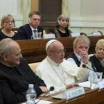 Pope Francis (center) delivered a speech at the Vatican on Saturday. 