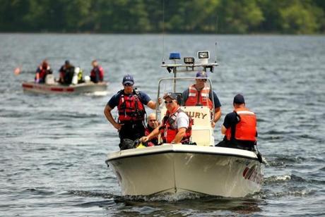 Pembroke 6/4/2016- Rescuers and divers were in Silver Lake again on Saturday as they searched for the body of a missing kayaker who was last seen on Friday. They launched their boats from the Pembroke shore of the lake behind the City of Brockton Water Filtration Plant. The boats returned to shore after divers spent time searching near the middle of the lake in the early afternoon. Globe staff photo by John Tlumacki(metro)
