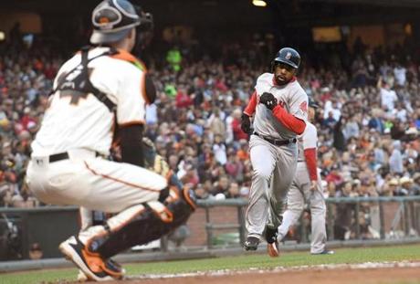 SAN FRANCISCO, CA - JUNE 07: Jackie Bradley Jr. #25 of the Boston Red Sox scores against the San Francisco Giants in the top of the second inning at AT&T Park on June 7, 2016 in San Francisco, California. (Photo by Thearon W. Henderson/Getty Images)
