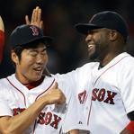 05/19/15: Boston, MA: Red Sox closer Koji Uehara (center) didn't have the smoothest bottom of the ninth inning as Texas pinch hitter Leonys Martin touched him up for a lead off home run. But after also giving up an infield single, he finally got out of the jam to earn the save, and a place in between manager John Farrell (left) and David Ortiz (right) in the post game celebration. The Boston Red Sox hosted the Texas Rangers in a regular season MLB game at Fenway Park. (Globe Staff Photo/Jim Davis) section: sports topic: Red Sox-Rangers (1)