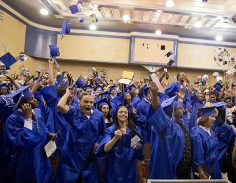 Graduates at Jeremiah Burke High School celebrated their graduation on Friday. 
