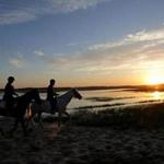 Edward Kislauskis and Denise Moraski enjoyed a romantic ride on Duxbury Beach at sunset.  