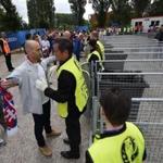 epa05366364 Security officials check Russian and Slovakian fans as they enter the Stade Pierre Mauroy ahead of the UEFA EURO 2016 group B preliminary round match between Russia and Slovakia at Stade Pierre Mauroy in Lille, France, 15 June 2016. EPA/ANDY RAIN