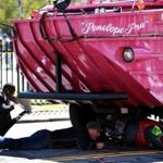 Investigators reviewed the scene of the April 30 crash in which a woman riding a scooter was struck and killed by a duck boat.