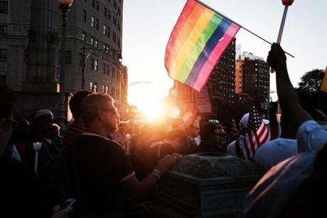 NEW YORK, NY - JUNE 14: Attendees listen to speakers at a memorial gathering for those killed in Orlando at Grand Army Plaza on June 14, 2016 in the Brooklyn borough of New York City. Forty-nine people were killed when a gunman opened fire at a gay nightclub in Orlando. It was the deadliest mass shooting in U.S. history. (Photo by Spencer Platt/Getty Images)

