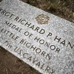 Malden, Ma. -- 6/8/16 -- The new foot stone. Sgt. Richard Hanley of the 7th Calvary received the Medal of Honor for his part in the Battle of Little Big Horn in 1876. The American Legion post in Malden has placed a foot stone at his grave in the Holy Cross Cemetery. John Graham (right, cq) and Michael Gill (cq) of American Legion Post 69 in Malden led the effort. Lane Turner/Globe Staff Photo Section: METRO Writer: Brian Maquarrie Topic: 09custer