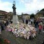 The public viewed floral tributes to murdered Labor MP Jo Cox in Birstall, England. 