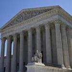 In this June 20, 2016, photo, The Supreme Court is seen in Washington. The eight-justice court has eight cases to resolve in the waning days of a trying and mournful term since the death of Justice Antonin Scalia in February. (AP Photo/Alex Brandon)