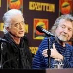 FILE - In this Oct. 9, 2012 file photo, Led Zeppelin guitarist Jimmy Page, left and singer Robert Plant appear at a press conference ahead of the theatrical release of 