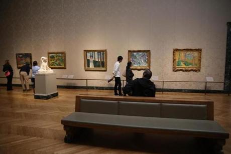 Museumgoers view 19th-century French art in the MFA?s Sidney and Esther Rabb Gallery.
