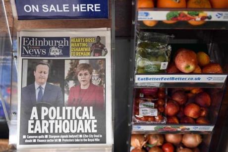 Newspapers reporting on the pro-Brexit result of the UK's EU referendum vote and with an image of British Prime Minister David Cameron and Scotland's First Minister and Leader of the Scottish National Party (SNP), Nicola Sturgeon, are pictured in a store in Edinburgh, Scotland on June 25, 2016. The result of Britain's June 23 referendum vote to leave the European Union (EU) has pitted parents against children, cities against rural areas, north against south and university graduates against those with fewer qualifications. London, Scotland and Northern Ireland voted to remain in the EU but Wales and large swathes of England, particularly former industrial hubs in the north with many disaffected workers, backed a Brexit. / AFP PHOTO / OLI SCARFFOLI SCARFF/AFP/Getty Images
