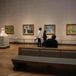 Museumgoers view 19th-century French art in the MFA?s Sidney and Esther Rabb Gallery.