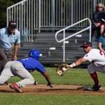 Chatham?s D.J. Artis slid back as the throw goes to Yarmouth-Dennis's Brendan Skidmore in a game at Red Wilson Field in South Yarmouth ? the first of five stops a reporter made on a one-day Cape Cod League odyssey. 