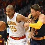 May 6, 2016; Atlanta, GA, USA; Atlanta Hawks center Al Horford (15) is fouled by Cleveland Cavaliers guard Matthew Dellavedova (8) during the first half in game three of the second round of the NBA Playoffs at Philips Arena. Mandatory Credit: Dale Zanine-USA TODAY Sports