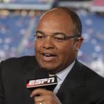 FILE - In this Sept. 14, 2009, file photo, ESPN broadcaster Mike Tirico speaks before an NFL football game between the New England Patriots and the Buffalo Bills in Foxborough, Mass. NBC announced Monday, May 9, 2016, that it had hired Tirico from ESPN. Tirico spent a quarter-century at ESPN, where he had handled play-by-play for 