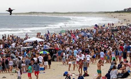 Nobadeer Beach on Nantucket's south shore drew an estimated 8,000 people, most of them college age on last Fourth of July. Police this year are discouraging young people from visiting, and plan aggressive enforcement of public drinking and trespassing laws.
