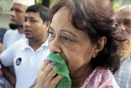 Hosne Ara Karim, whose son and daughter-in-law were rescued from the restaurant that was attacked by heavily armed militants, wait for them in Dhaka, Bangladesh, Saturday, July 2, 2016. Bangladesh forces stormed the restaurant where militants held dozens of people hostage for 10 hours Saturday morning. (AP Photo)
