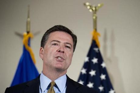 FBI Director James Comey makes a statement at FBI Headquarters in Washington, Tuesday, July 5, 2016. Comey said the FBI will not recommend criminal charges in its investigation into Hillary Clinton's use of a private email server while secretary of state. (AP Photo/Cliff Owen)
