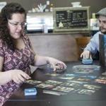 Owner Devon Trevelyan and manager Rachel Esteban played Mysterium at the Knight Moves. 