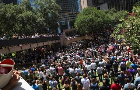 People gathered to hold a faith vigil in Dallas.
