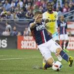 Foxborough MA 7/9/16 New England Revolution Chris Tierney clears the ball in front of Columbus Crew SC Mohammed Saeid during first half action at Gillette Stadium on Saturday July 9, 2016. (Photo by Matthew J. Lee/Globe staff) topic: reporter: 