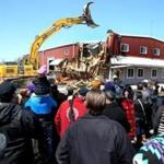 04052016 Taunton Ma Cedric Cromwell (cq) Chairmen,Mashpee Wampanoag Tribal Nation demolishes one of the first buildings on casino site while at the controls of equipment used to take down building. Globe/Staff Photographer Jonathan Wiggs