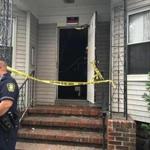 At 2 Kingsley Terrace in Lynn, the apartment was blocked off by crime scene tape on Monday, and a red stain could be seen on the inside of the front door. 