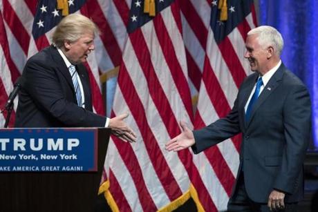 Republican presidential candidate Donald Trump, left, shook hands with Gov. Mike Pence, R-Ind., during a campaign event to announce Pence as the vice presidential running mate on, Saturday.
